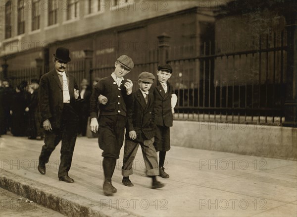 Three Young Boys Heading to the Ayer Textile Mill, 6:30 to 7:00 a.m., Lawrence, Massachusetts, USA, Lewis Hine for National Child Labor Committee, September 1911