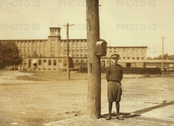 Clarence Noel, Full-Length Portrait, Works as Doffer at Hodges Fibre Carpet Company, Indian Orchard, Massachusetts, USA, Lewis Hine for National Child Labor Committee, September 1911