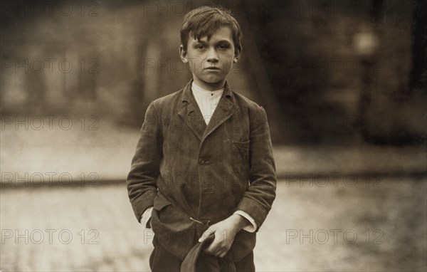 Joseph Philip, Pin Boy at Les Miserables Bowling Alley, Said he was 11 years old, Worked until Midnight every Night, Half-Length Portrait, Lowell, Massachusetts, USA, Lewis Hine for National Child Labor Committee, October 1911