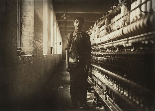 Stanley Cherpiak, Full-Length Portrait, Spinning Room, Chicopee, Massachusetts, USA, Lewis Hine for National Child Labor Committee, November 1911