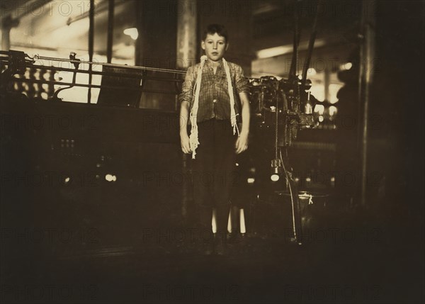 Dosilav Loselle, Full-Length Portrait, Works as Band Boy at Textile Mill, Chicopee, Massachusetts, USA, Lewis Hine for National Child Labor Committee, November 1911