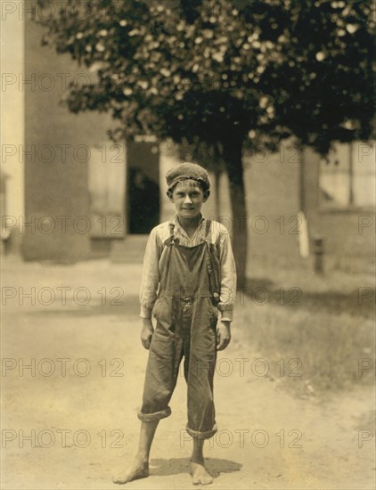 Johnnie Beam, Appears to be under 12 years old, Full-Length Portrait, Young Worker at Manufacturing Company, Pelzer, South Carolina, USA, Lewis Hine for National Child Labor Committee, May 1912