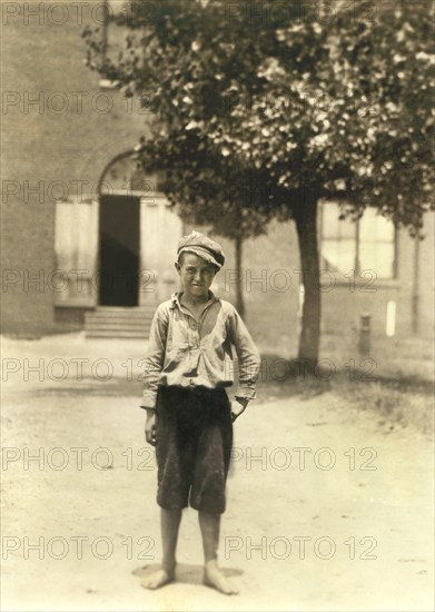 Appears to be under 12 years old, Full-Length Portrait, Young Sweeper at Manufacturing Company, Pelzer, South Carolina, USA, Lewis Hine for National Child Labor Committee, May 1912