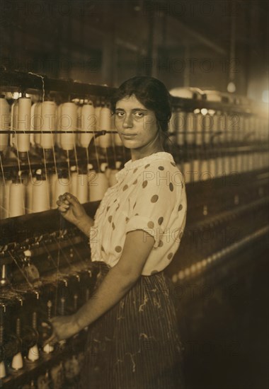 Young Spinner in Textile Mill, Fall River, Massachusetts, USA, Lewis Hine for National Child Labor Committee, June 1916