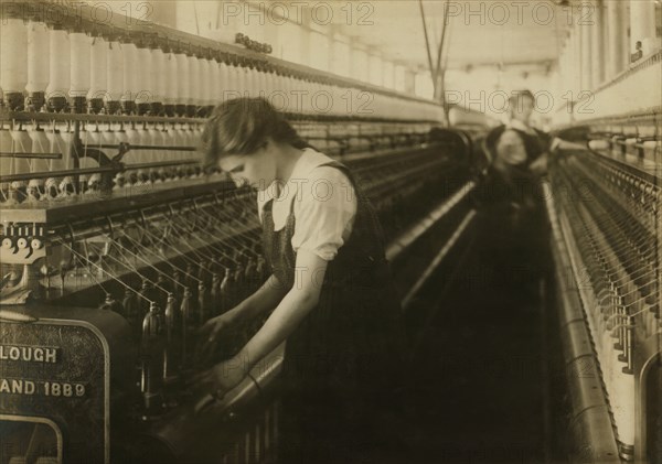 Bertha Bonneau, 15 years old, Doffer on Jack Speeder in Card Room, King Philip Mills, Fall River, Massachusetts, USA, Lewis Hine for National Child Labor Committee, June 1916