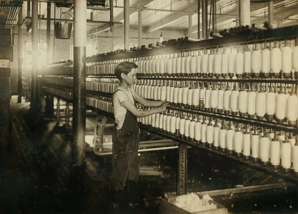 Charles Cavanaugh, Working as Back Boy in Mule Spinning Room, King Philip Mills, Fall River, Massachusetts, USA, Lewis Hine for National Child Labor Committee, June 1916