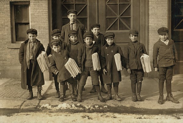 Group of Young Newsies Selling Newspapers, Portrait Standing on Sidewalk, Hartford, Connecticut, USA, Lewis Hine for National Child Labor Committee, March 1909