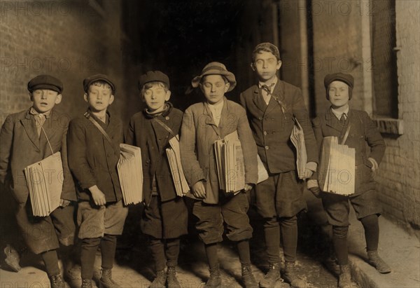 Group of Young Newsboys Selling Newspapers after 9:00 p.m., Full-Length Portrait, Newark, New Jersey, USA, Lewis Hine for National Child Labor Committee, December 1909