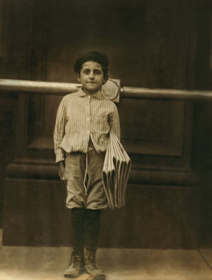 8-year-old Newsie Selling Newspapers at Planters Hotel, St. Louis, Missouri, USA, Lewis Hine for National Child Labor Committee, May 1910