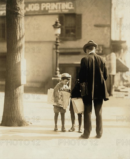 Young Boy, 7 years old, Selling Newspapers on Street, Wilmington, Delaware, USA, Lewis Hine for National Child Labor Committee, May 1910