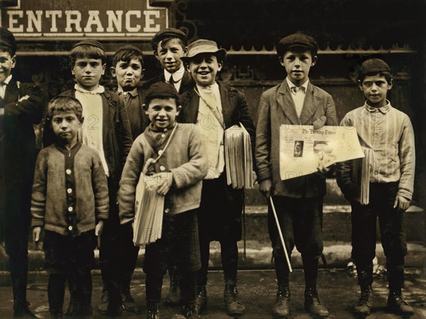 Full-Length Portrait of Young Newsboys on Sidewalk, Philadelphia, Pennsylvania, USA, Lewis Hine for National Child Labor Committee, June 1910