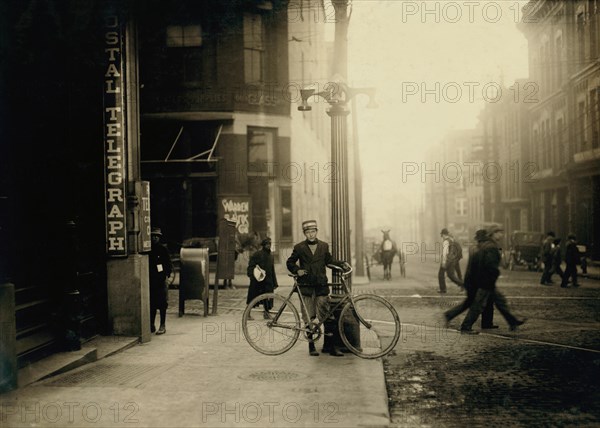 George Christopher, 14 years old, Telegraph Messenger, Full-Length Portrait with Bicycle, Nashville, Tennessee, USA, Lewis Hine for National Child Labor Committee, November 1910