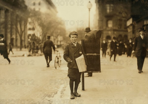 Joseph O'Connor, 12-year-old Truant Boy Selling Newspapers during School Hours, Full-Length Portrait, Washington DC, USA, Lewis Hine for National Child Labor Committee, April 1912