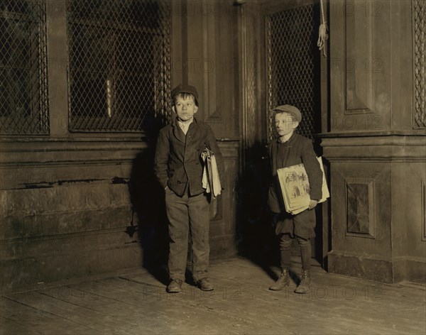 Peter (left), 15 years old, Charles, 11 years old, Employed in Camphor Works, Sells Newspapers Saturday Nights until 3:00 a.m., Full-Length Portrait Selling Newspapers at 1:30 a.m., Newark, New Jersey, USA, Lewis Hine for National Child Labor Committee, November 1912
