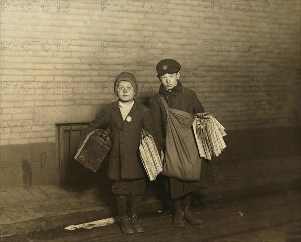 Stanley Steiner, 10 years old, Boot-Black and Newsboy, & Jacob Botvin, 13 years old, Newsboy, Full-Length Portrait Working at 1:00am, Providence, Rhode Island, USA, Lewis Hine for National Child Labor Committee, November 1912