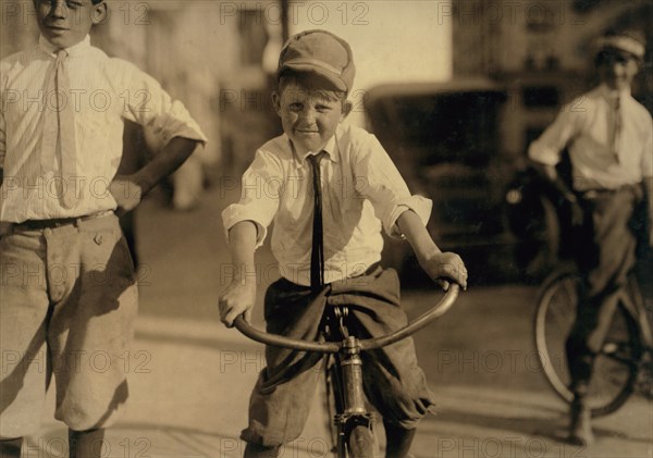 Jeff Miller, Delivery Boy for Magnolia Pharmacy, Recently Returned from Seabrook Reform School where he had spent a year, Full-Length Portrait with Bicycle, Houston, Texas, USA, Lewis Hine for National Child Labor Committee, October 1913