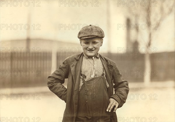 Young Boy on Lunch Break, Half-Length Portrait, Singer Manufacturing Company, South Bend, Indiana, USA, Lewis Hine for National Child Labor Committee, October 1908