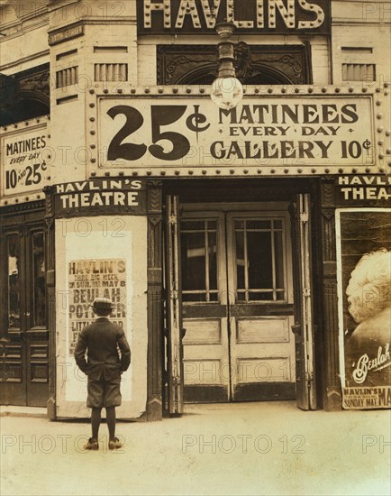 Young Boy Outside, Motion Picture Theater, St. Louis, Missouri, USA, Lewis Hine for National Child Labor Committee, May 1910