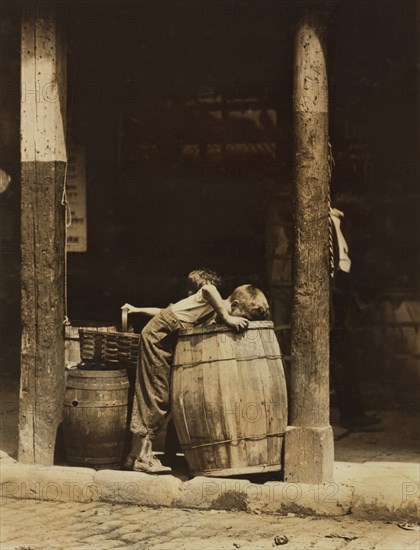 Two Young Brothers Picking Discarded Fruit out of Barrels near 14th Street, New York City, New York, USA, Lewis Hine for National Child Labor Committee, July 1910