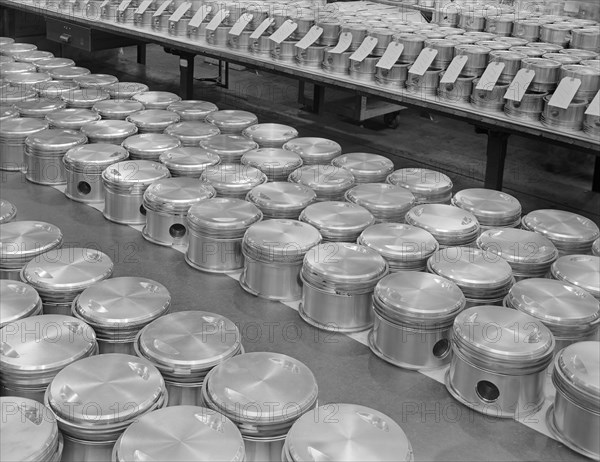 Airplane Engine Pistons, Complete with Rings, are Lined up for Assembly at Manufacturing Plant, Pratt & Whitney, East Hartford, Connecticut, USA, Andreas Feininger for Office of War Information, June 1942