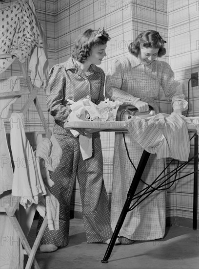 Two Government Workers Dressed at Home for Sixty-five Degree Maximum Temperature Recommended by the Fuel Oil Limitation Order, Washington DC, USA, Albert Freeman for Office of War Information, October 1942