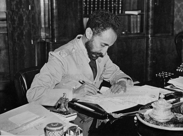 Haile Selassie (1892-1975), Emperor of Ethiopia, Portrait Writing Letter to U.S. President Franklin Roosevelt Upon his Return to Addis Ababa, Ethiopia after Allied Defeat of Italian Fascist Occupation Forces, Office of War Information, 1941