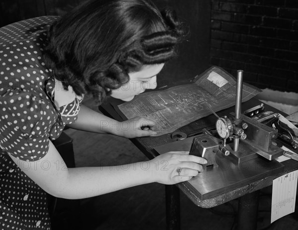Estelle Wilson, one of a Razor Factory's Many Women Workers, Checking Completed V-blocks with Blueprint Specification, as this factory was Sub-Contracted for Production of War Tools, Boston, Massachusetts, USA, Howard R. Hollem for Office of War Information, February 1942