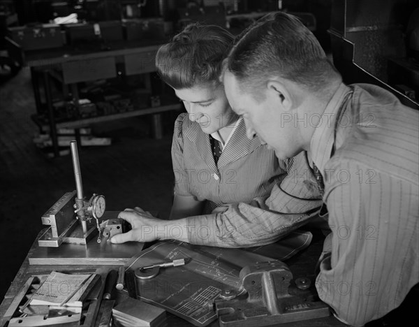 Shop Supervisor George Cole Explaining Testing Processes to Edith Krause, as this Razor Factory was Sub-Contracted for Production of War Tools, Boston, Massachusetts, USA, Howard R. Hollem for Office of War Information, February 1942
