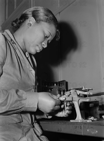 Mignon Gunn, Female Factory Worker, Reconditioning used Spark Plugs to be re-used in Testing Military Aircraft Motors at Buick Plant Converted for War Product Production, Melrose Park, Illinois, USA, Ann Rosener, Office of War Information, July 1942