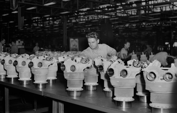 Cylinder Barrels Lined up for Inspection at Buick Plant Converted for War Product Production, Melrose Park, Illinois, USA, Ann Rosener, Office of War Information, July 1942