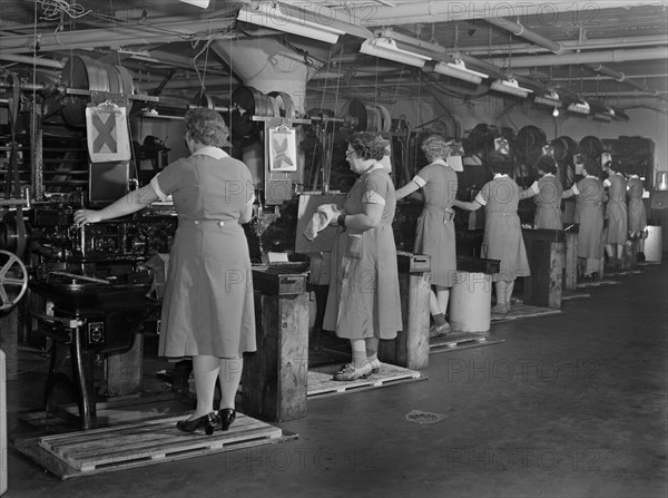 Row of Female Factory Workers Operating Machinery at Drill and Tool Plant that Manufactures Drills for use in all War Production Industries, Republic Drill and Tool Company, Chicago, Illinois, USA, Ann Rosener, Office of War Information, August 1942