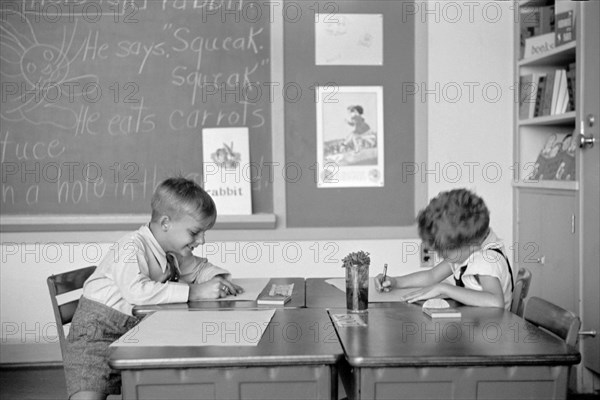 Two Young Boys Drawing at Desks in Classroom, Greenhills, Ohio, USA, a Greenbelt Community Constructed by U.S. Department of Agriculture as Part of President Franklin Roosevelt's New Deal, John Vachon for U.S. Resettlement Administration, October 1938