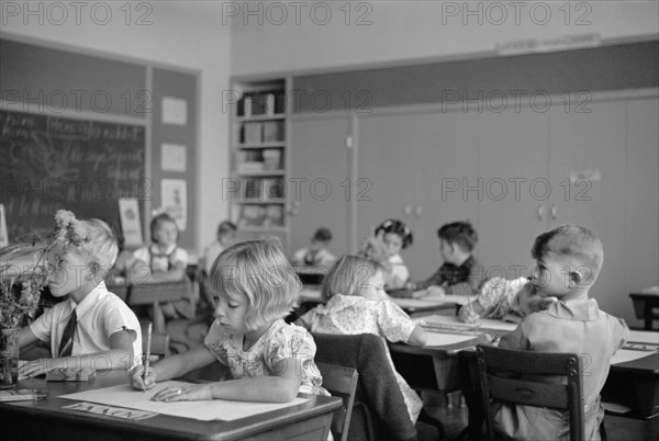 Children Drawing at Desks in Classroom, Greenhills, Ohio, USA, a Greenbelt Community Constructed by U.S. Department of Agriculture as Part of President Franklin Roosevelt's New Deal, John Vachon for U.S. Resettlement Administration, October 1938