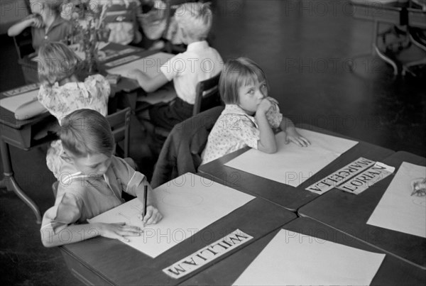 Group of Children Drawing at Desks in Classroom, Greenhills, Ohio, USA, a Greenbelt Community Constructed by U.S. Department of Agriculture as Part of President Franklin Roosevelt's New Deal, John Vachon for U.S. Resettlement Administration, October 1938