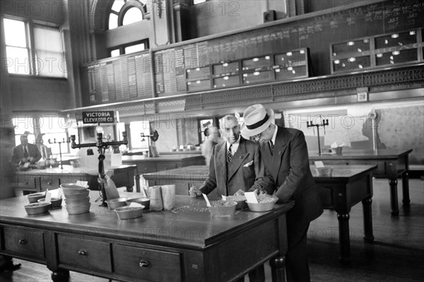 Buyer at Open Grain Market, Minneapolis Grain Exchange, Minneapolis, Minnesota, USA, John Vachon for Farm Security Administration, September 1939