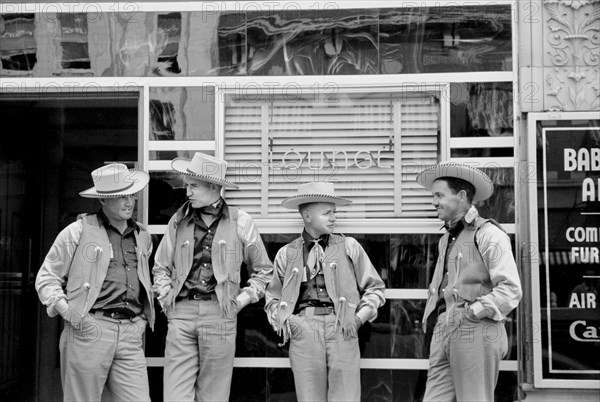 Four Cowboys Dressed Alike in Front of Bar, Billings, Montana, USA, Arthur Rothstein for Farm Security Administration, July 1939