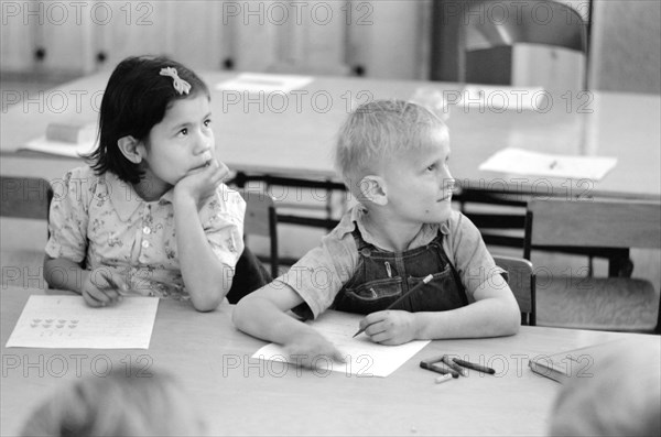 Two Children of Migratory Workers in Elementary School Classroom at FSA Camp, Weslaco, Texas, USA, Arthur Rothstein for Farm Security Administration, February 1942