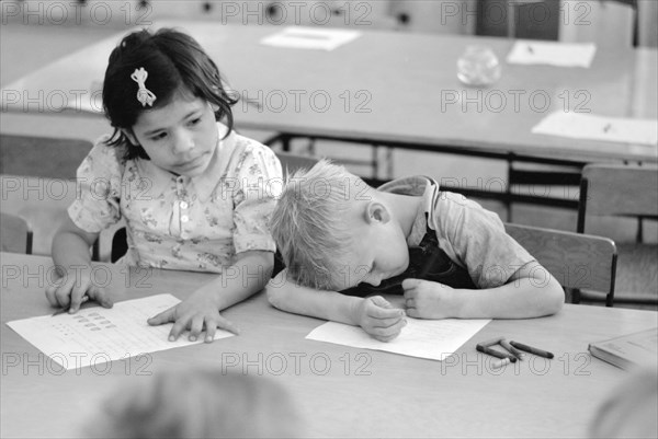 Two Children of Migratory Workers in Elementary School Classroom at FSA Camp, Weslaco, Texas, USA, Arthur Rothstein for Farm Security Administration, February 1942