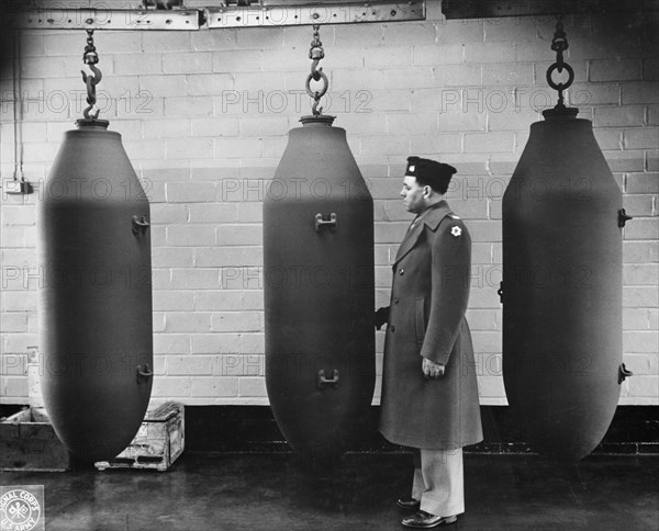 Three 2,000-pound Bombs awaiting Transport from Factory, Ravenna, Ohio, USA, Office of War Information, March 1943