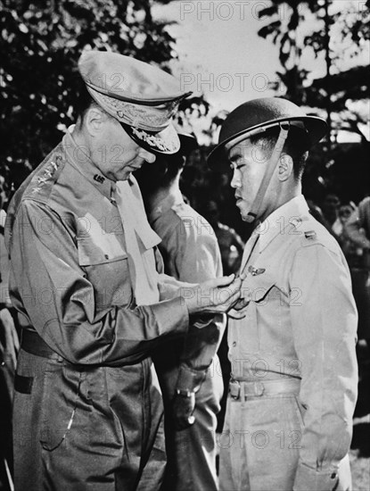 U.S. General Douglas MacArthur (left) Pinning Distinguished Service Cross on Captain Jesus A. Villamor of the Philippine Air Force for Heroism in the Air, Manila, Philippines, Office of War Information, December 22,1941