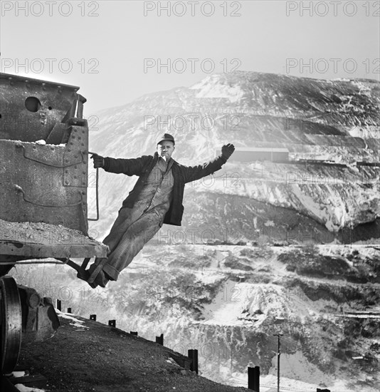 Brakeman of an Ore Train at Open-Pit Mining Operations, Utah Copper Company, Bingham Canyon, Utah, USA, Andreas Feininger for Office of War Information, November 1942