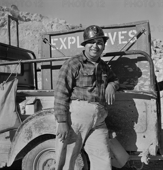 Portrait of Worker that Transports and Dispenses Explosive used for Blasting at Large Copper Mining Operation, which Supplies Great Quantities of Copper so vital to War Effort, Phelps-Dodge Mining Company, Morenci, Arizona, USA, Fritz Henle for Office of War Information, December 1942