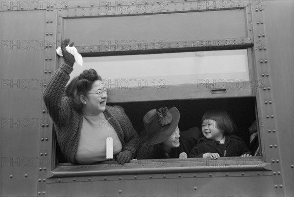 Japanese-Americans on Train to Owens Valley During Evacuation of Japanese-Americans from West Coast Areas under U.S. Army War Emergency Order, Los Angeles, California, USA, Russell Lee, Office of War Information, April 1942