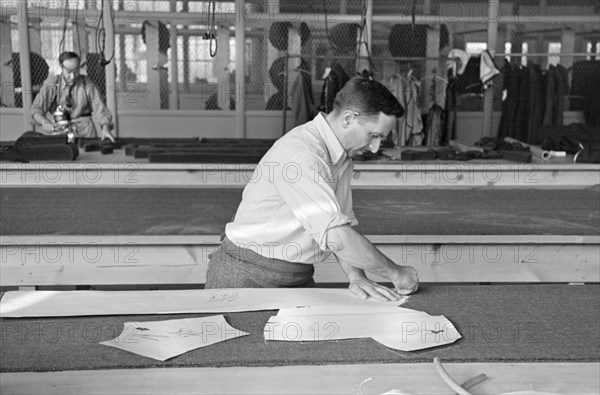 Luis Gushen, Chief Cutter in Cooperative Garment Factory at Jersey Homesteads, Marking out Pattern of Woman's Coat, which will be made in the Factory, Hightstown, New Jersey, USA, Russell Lee, U.S. Resettlement Administration, November 1936