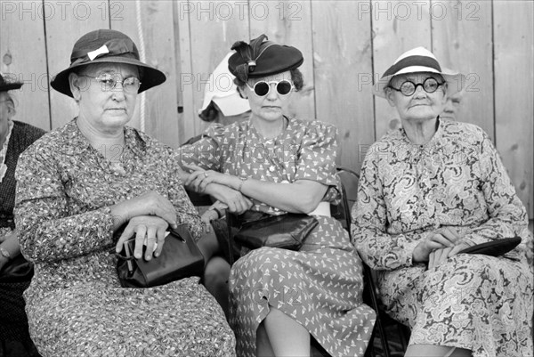 Three Women at 4-H Club Fair, Cimarron, Kansas, USA, Russell Lee, Farm Security Administration, August 1939