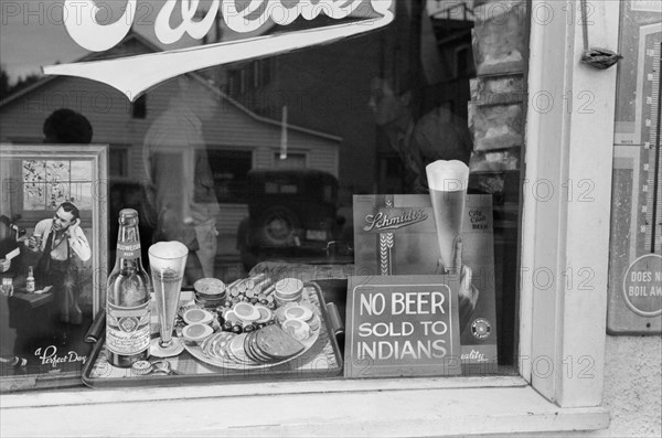 Sign in Beer Parlor Window, "No Beer Sold to Indians", Sisseton, South Dakota, USA, John Vachon, Farm Security Administration, September 1939