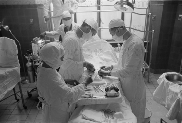 Surgeons Performing Surgery in Operating Room, Provident Hospital, Chicago, Illinois, USA,