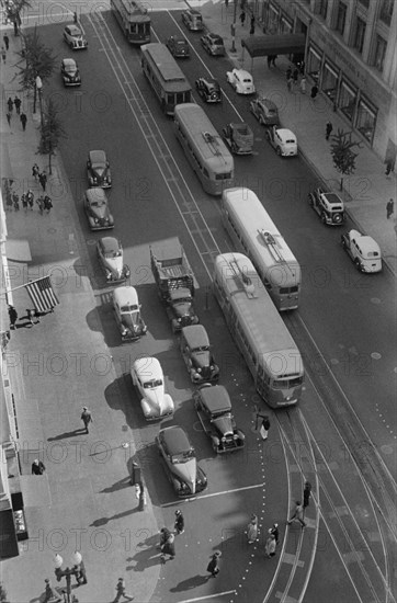 High Angle View of Street Scene with Pedestrians, Street Cars and Automobiles, 14th Street and Pennsylvania Avenue, Washington DC, USA, David Myers, Farm Security Administration, 1939