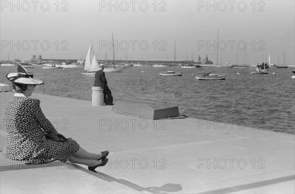 Man and Woman Sitting near Boat Basin, Lake Michigan, Chicago, Illinois, USA, John Vachon, Farm Security Administration, July 1941