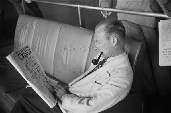 Passenger Waiting in Lobby of Municipal Airport, Washington DC, USA, Jack Delano, Farm Security Administration, July 1941